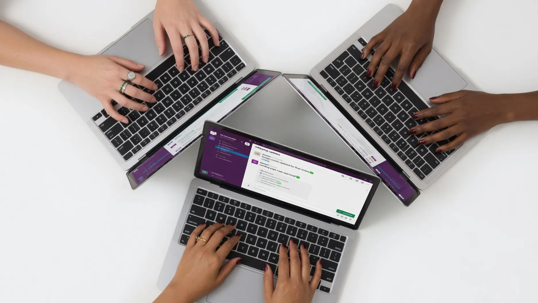 Three engineers shipping in parallel on three laptops
